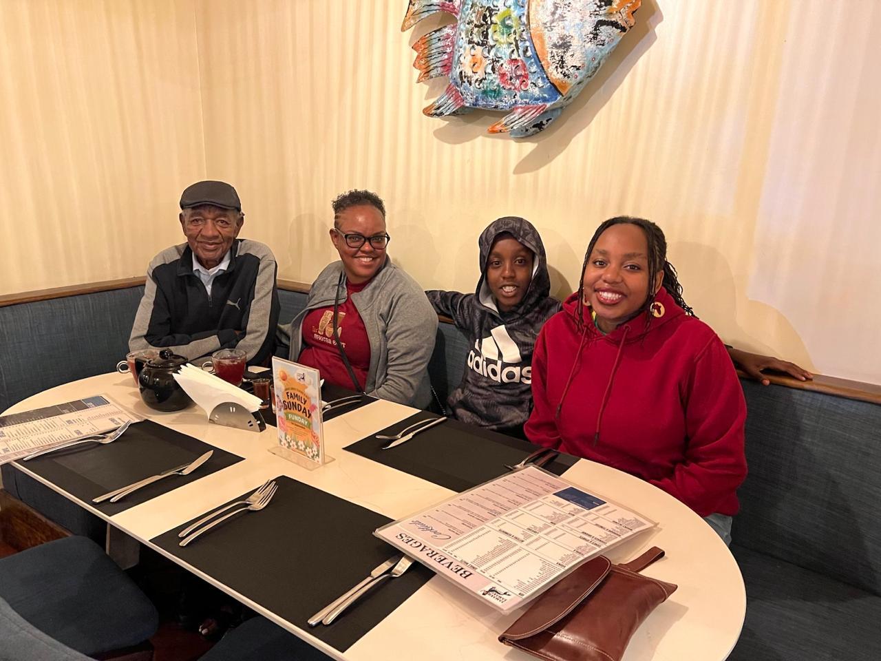Clement dining with family