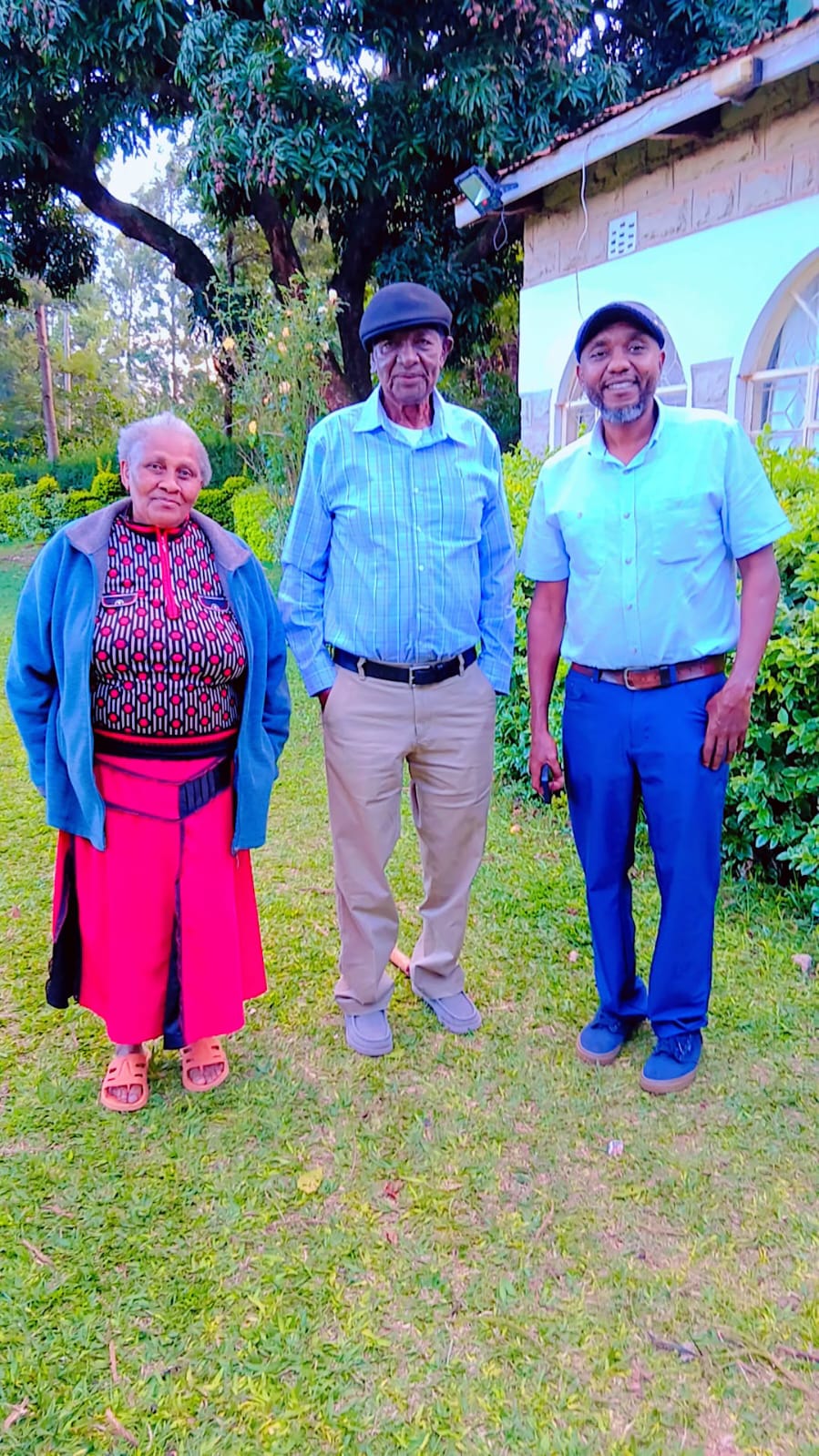 Clement with family in garden