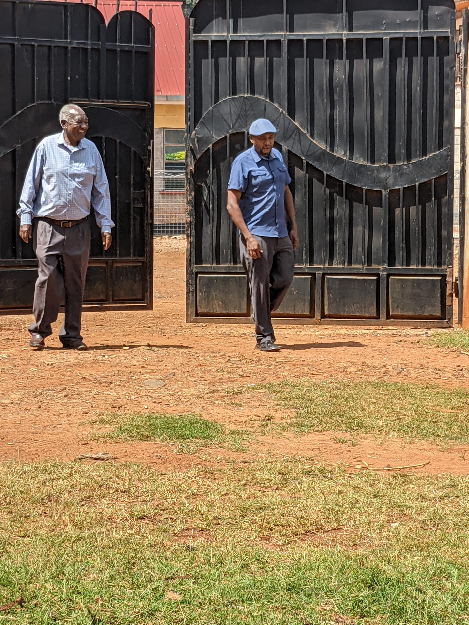 Clement walking through gate